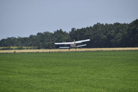 Aircraft agricultural aviation AN-2. Landing on the field for filling fertilizers An-2.