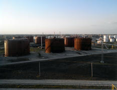 Tank the vertical steel. Oil refinery. Equipment for primary oil refining
