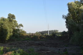 Carrying out power lines across the river. The construction of the power line