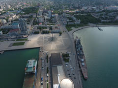 Top view of the marina and quay of Novorossiysk. Urban landscape of the port city.