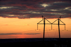 Столбы на фоне заката 