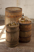 Oak barrels and bottled whiskey