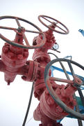 Red valves on the oil field