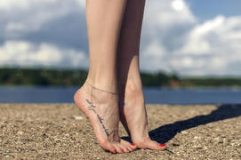 Elegant legs on the beach