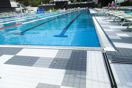 The swimming pool under beams of the sun is ready to competitions and rest